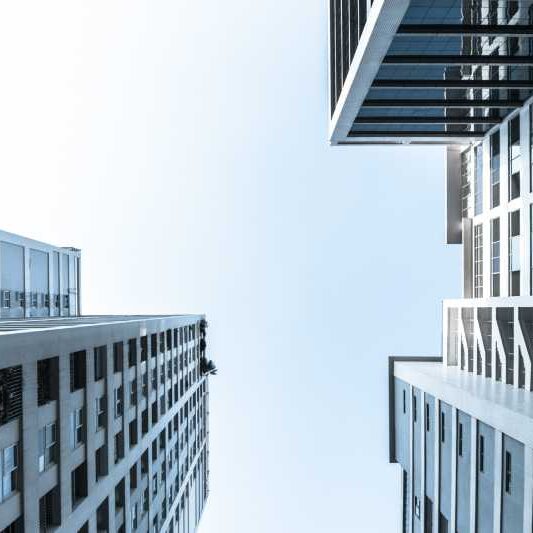 Commercial Buildings High-rise commercial office buildings, pictured on a sunny day